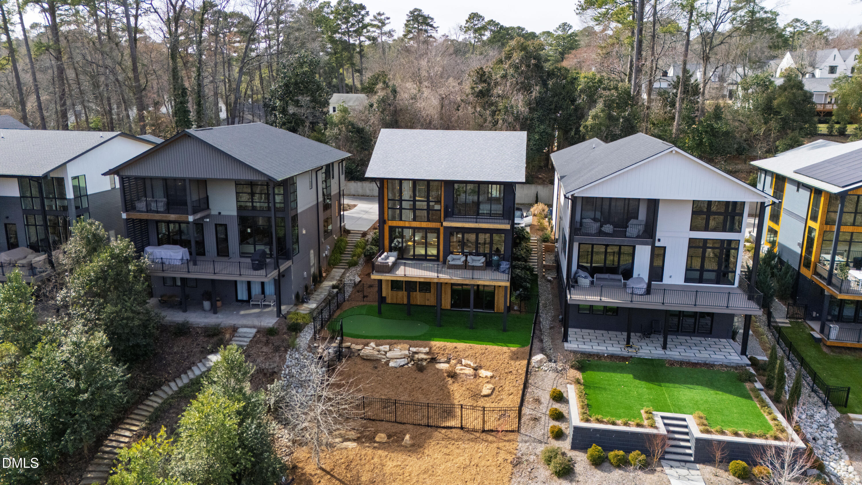 1617 Nottingham Road Raleigh, NC 27607 - Photo 67 of 76 a view of an house with backyard space and patio