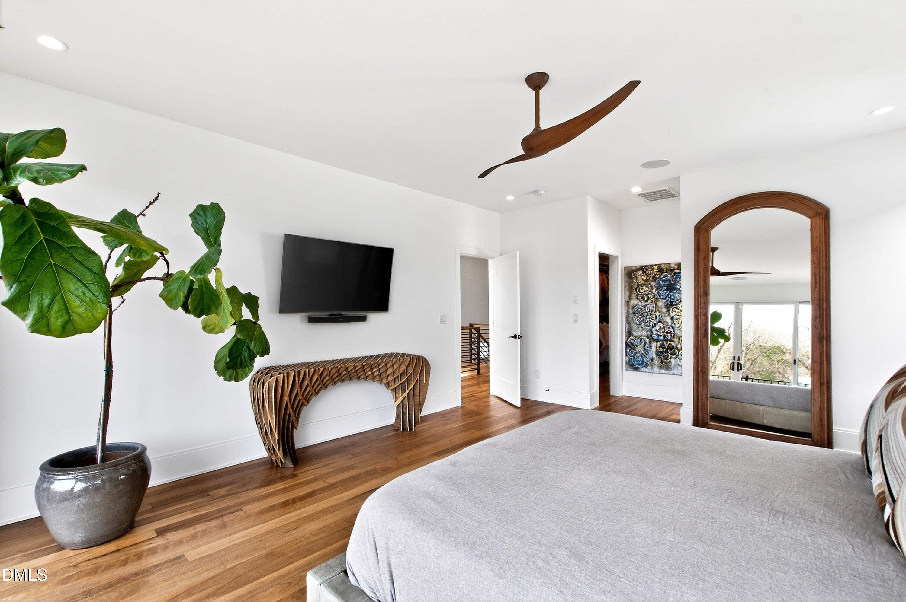 1617 Nottingham Road Raleigh, NC 27607 - Photo 9 of 76 a bedroom with a bed and a flat screen tv