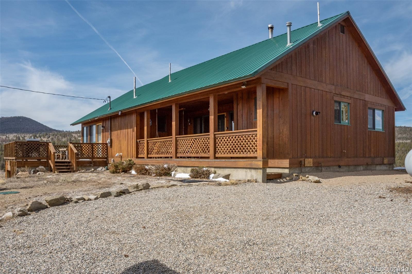 3750 Singletree Road Hartsel, CO 80449 - Photo 1 of 46 a front view of a house with a yard