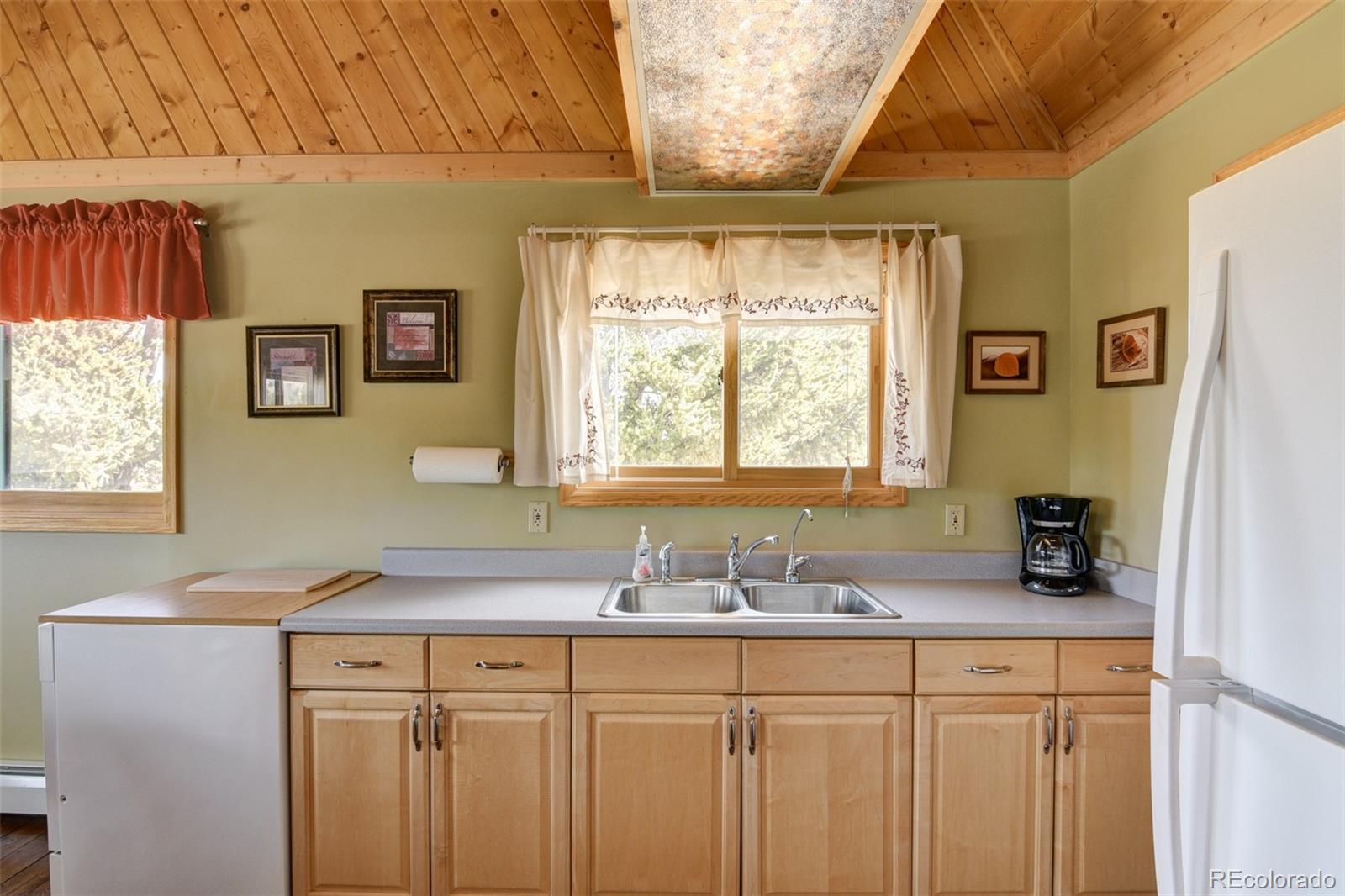 3750 Singletree Road Hartsel, CO 80449 - Photo 24 of 46 a bathroom with a sink and a window