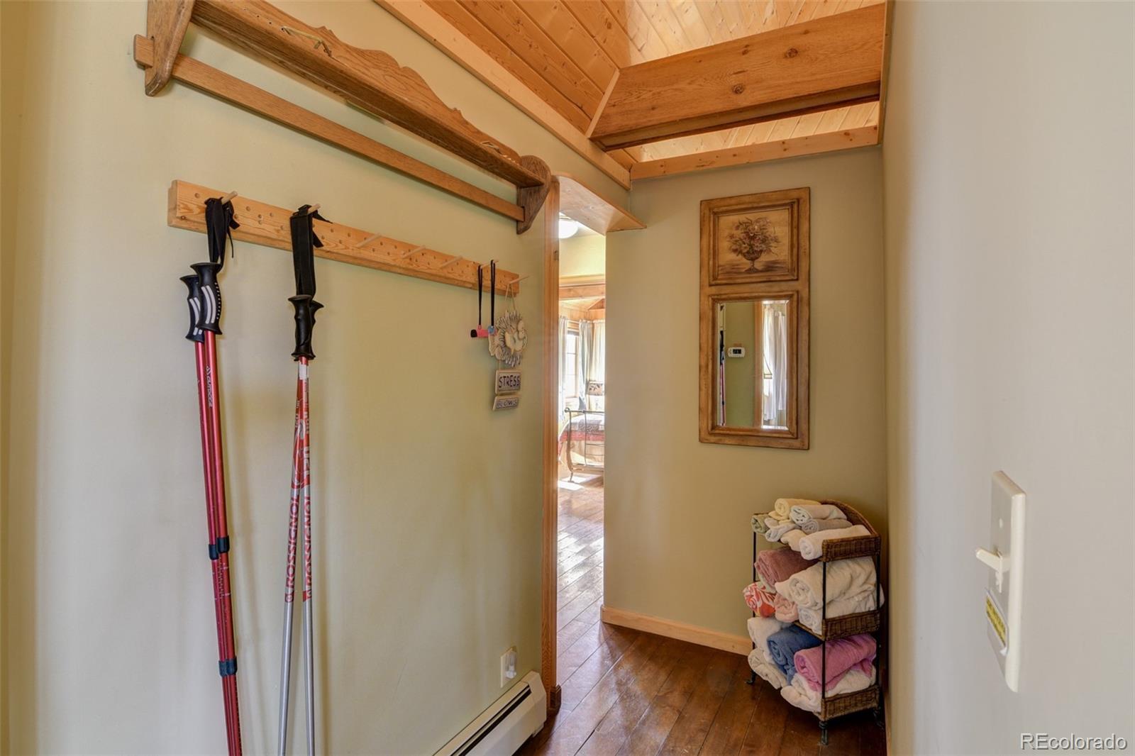 3750 Singletree Road Hartsel, CO 80449 - Photo 28 of 46 a view of a room with wooden floor and closet