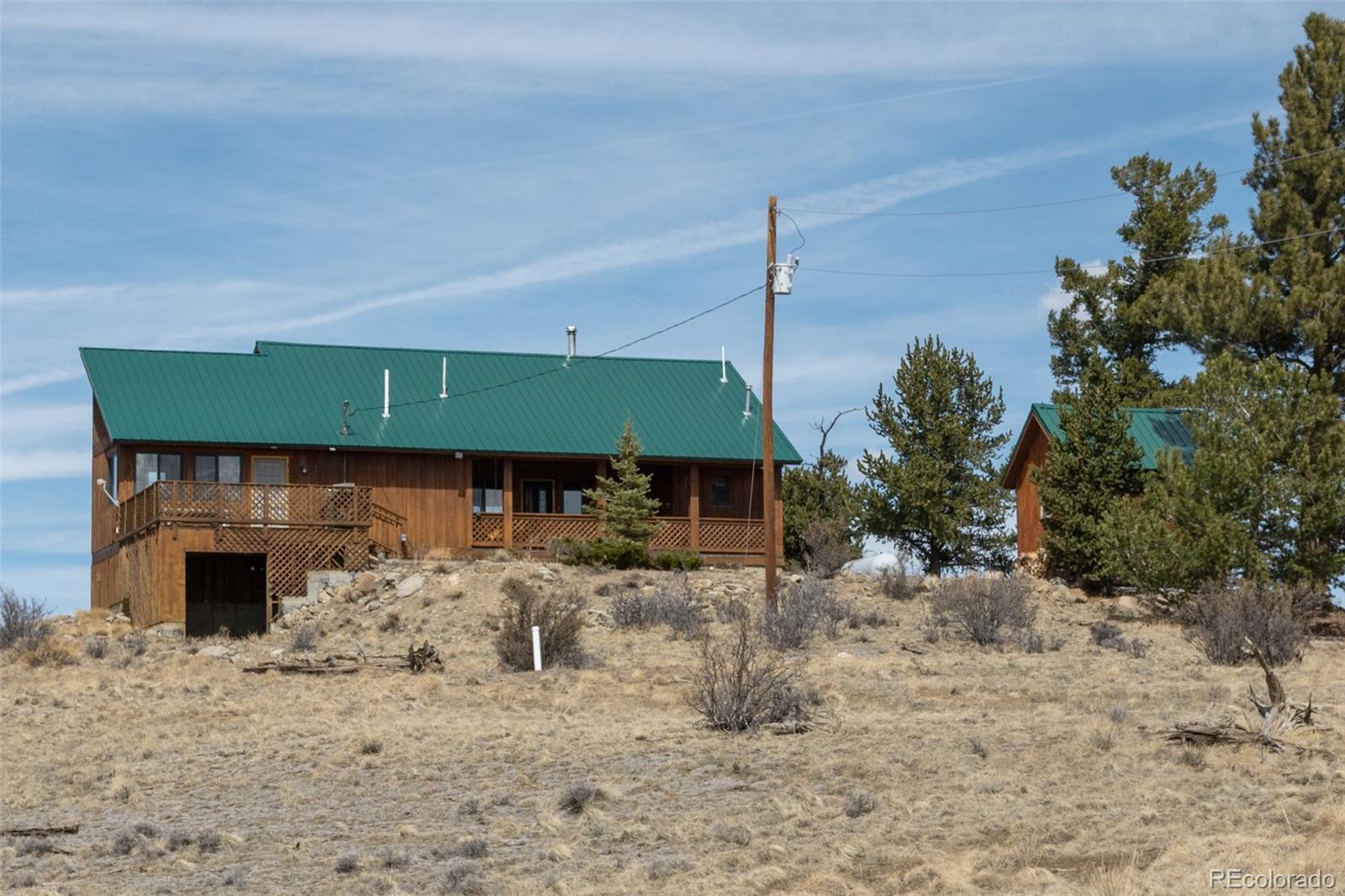 3750 Singletree Road Hartsel, CO 80449 - Photo 3 of 46 a aerial view of a house with a yard