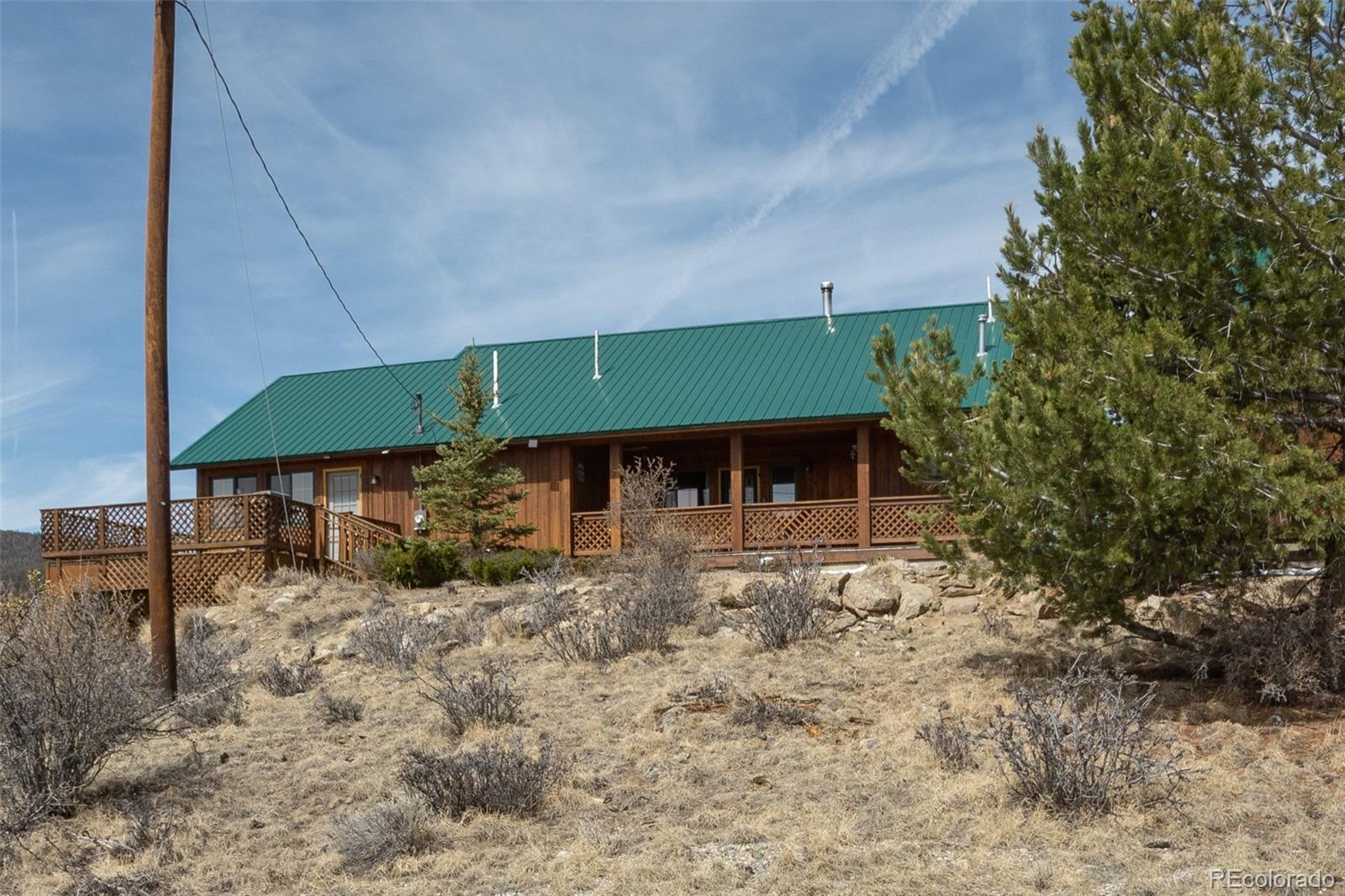 3750 Singletree Road Hartsel, CO 80449 - Photo 42 of 46 a view of a house with a yard