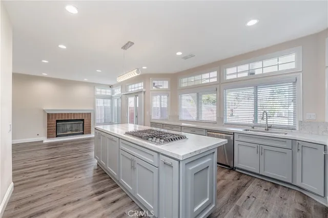 a kitchen with a stove and a sink