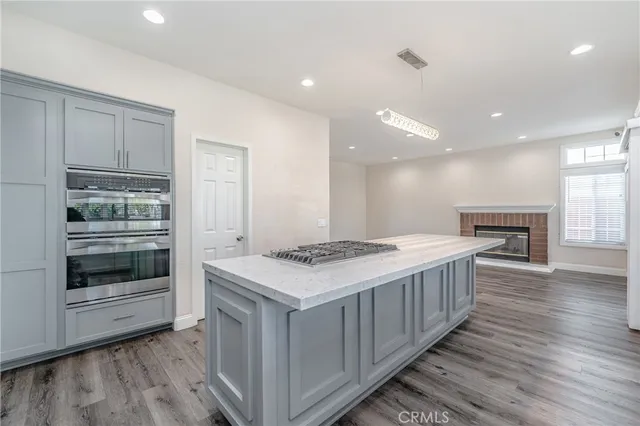 a kitchen with a stove and a sink