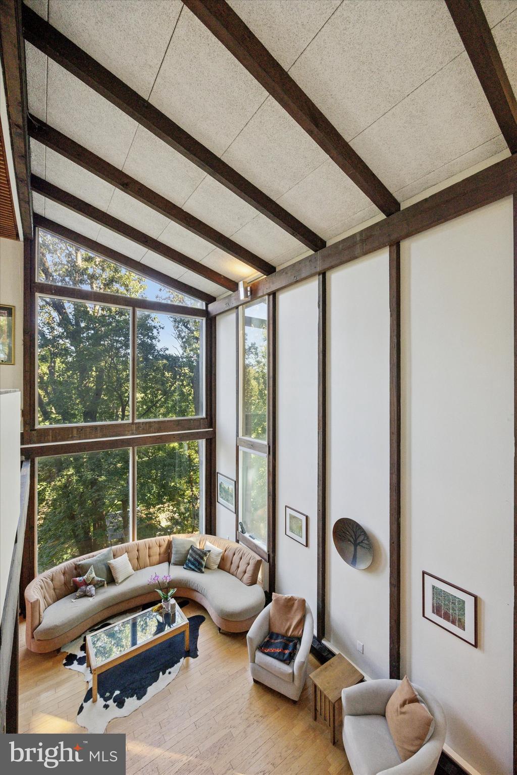 1430 Hopeland Road Wyncote, PA 19095 - Photo 13 of 37 a living room with furniture and floor to ceiling windows
