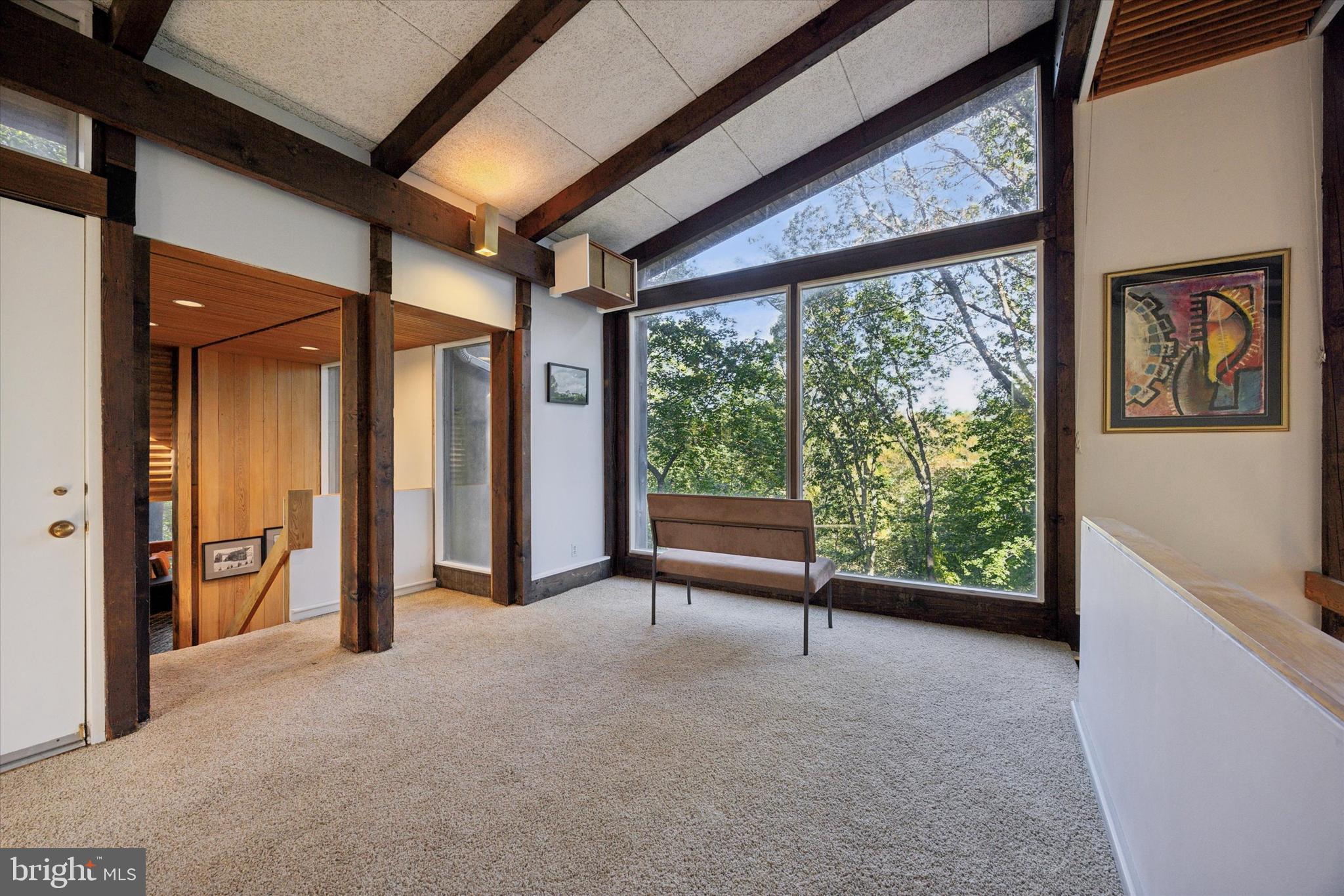 1430 Hopeland Road Wyncote, PA 19095 - Photo 16 of 37 a view of an empty room with large windows