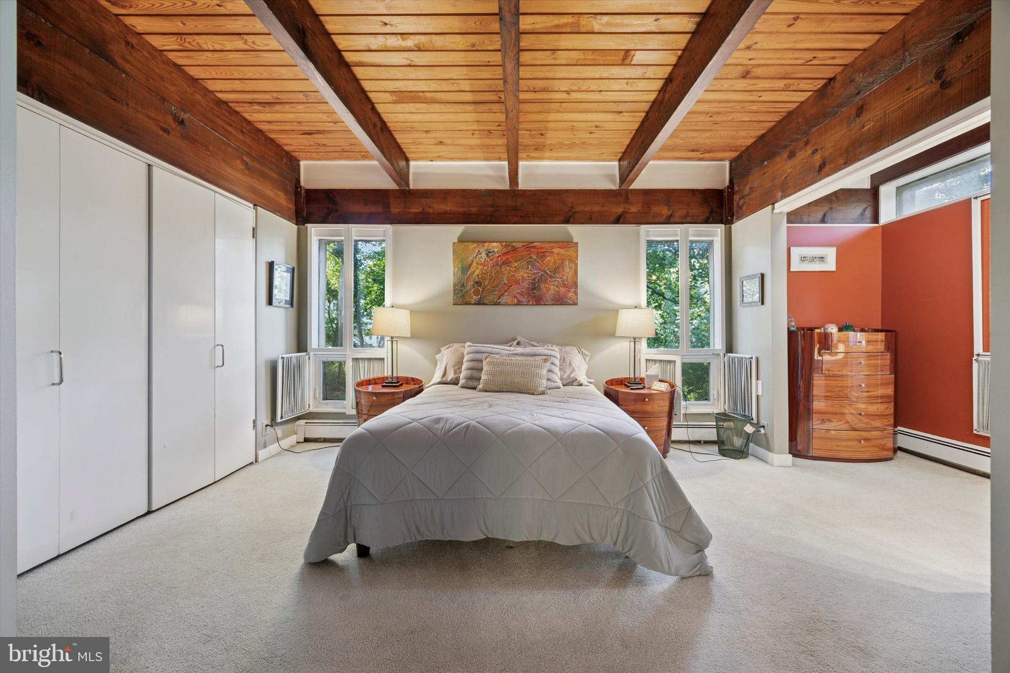 1430 Hopeland Road Wyncote, PA 19095 - Photo 20 of 37 a bedroom with a bed and a large window