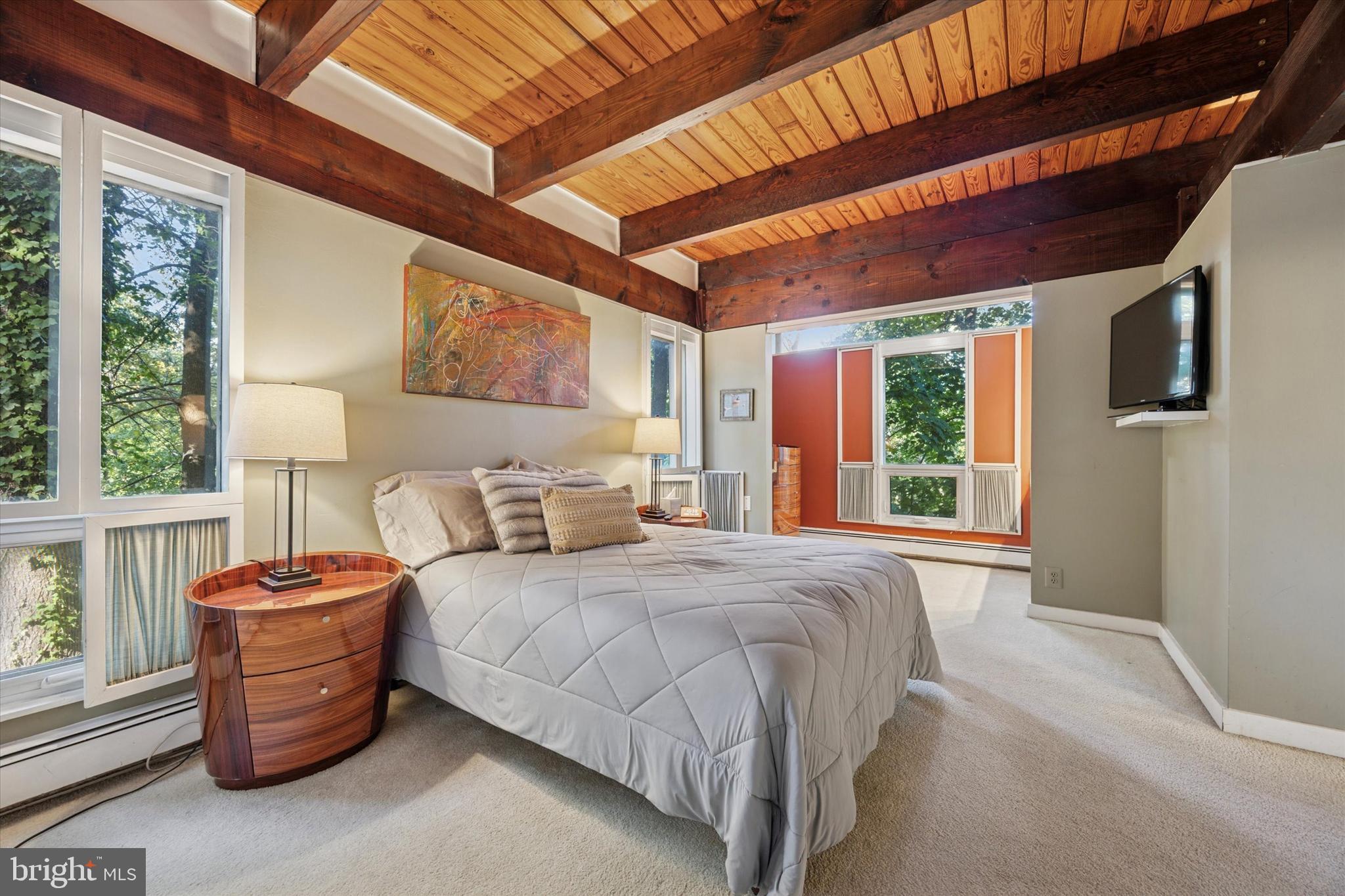 1430 Hopeland Road Wyncote, PA 19095 - Photo 21 of 37 a bed room with a bed and a chair
