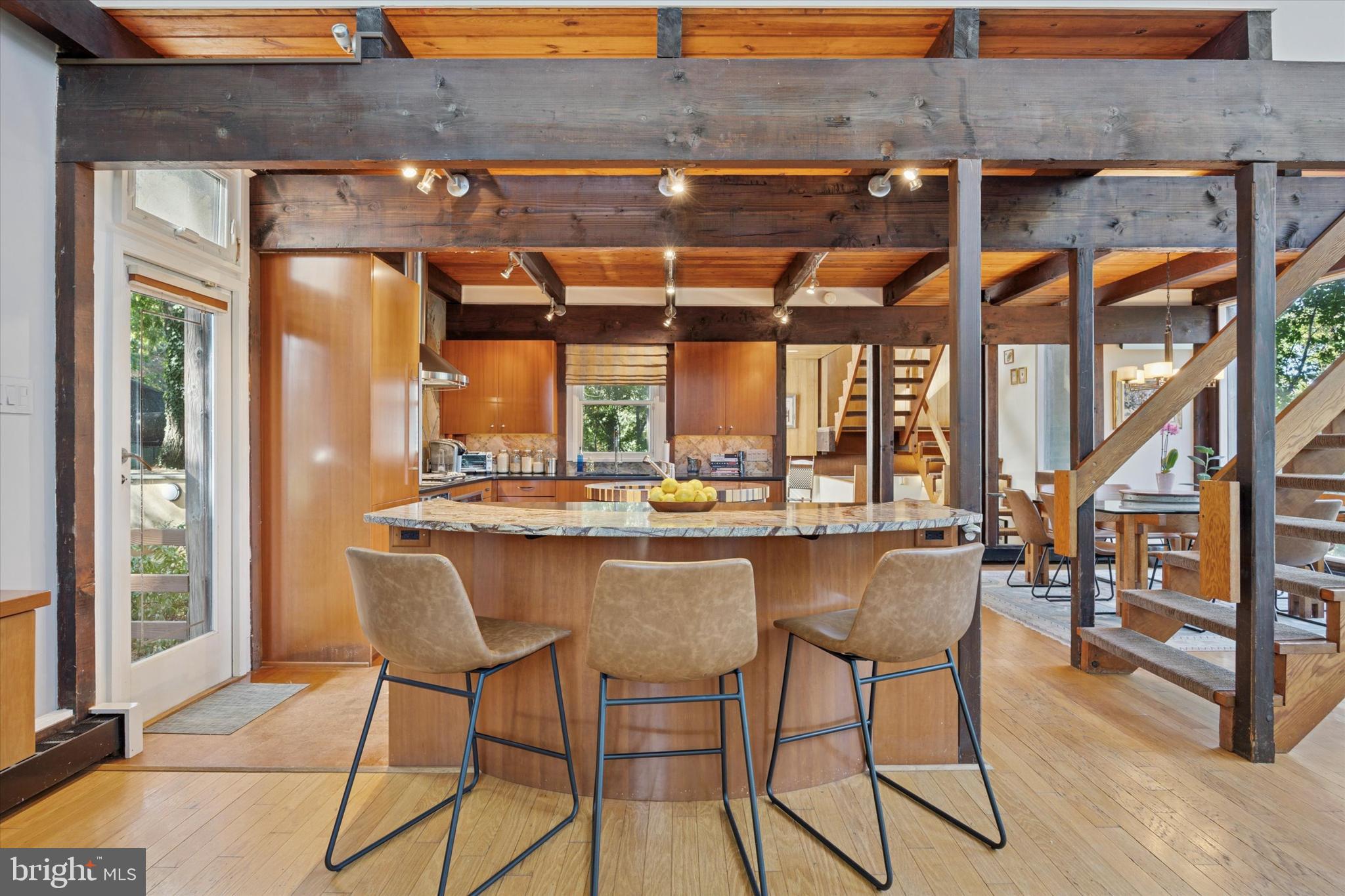 1430 Hopeland Road Wyncote, PA 19095 - Photo 5 of 37 a dining room with furniture and a floor to ceiling window