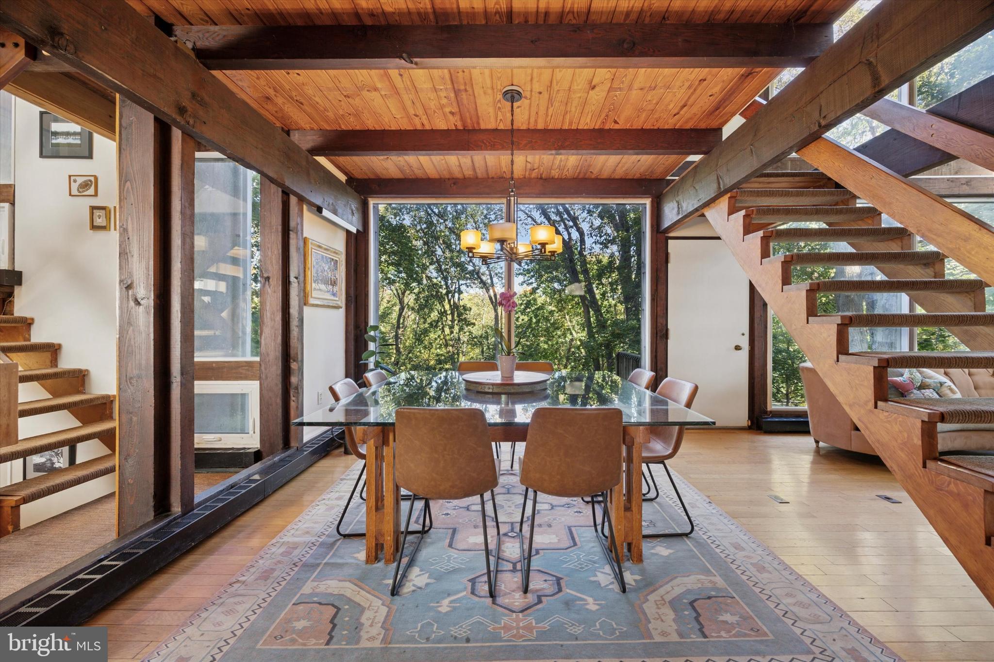 1430 Hopeland Road Wyncote, PA 19095 - Photo 7 of 37 a dining room with furniture wooden floor and a rug