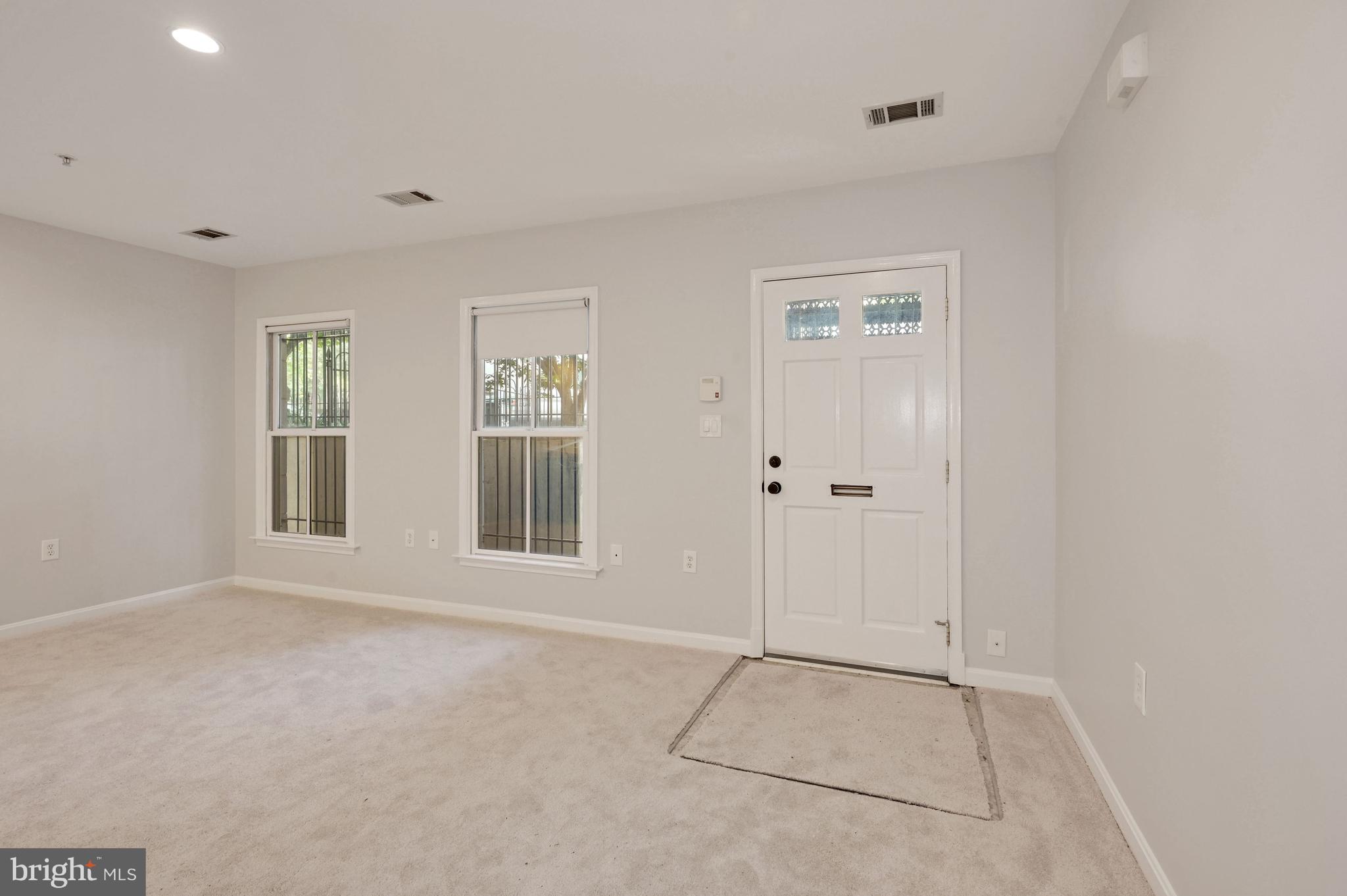 648 C Street Northeast, Unit 1 Washington, DC 20002 - Photo 4 of 17 a view of an empty room with window