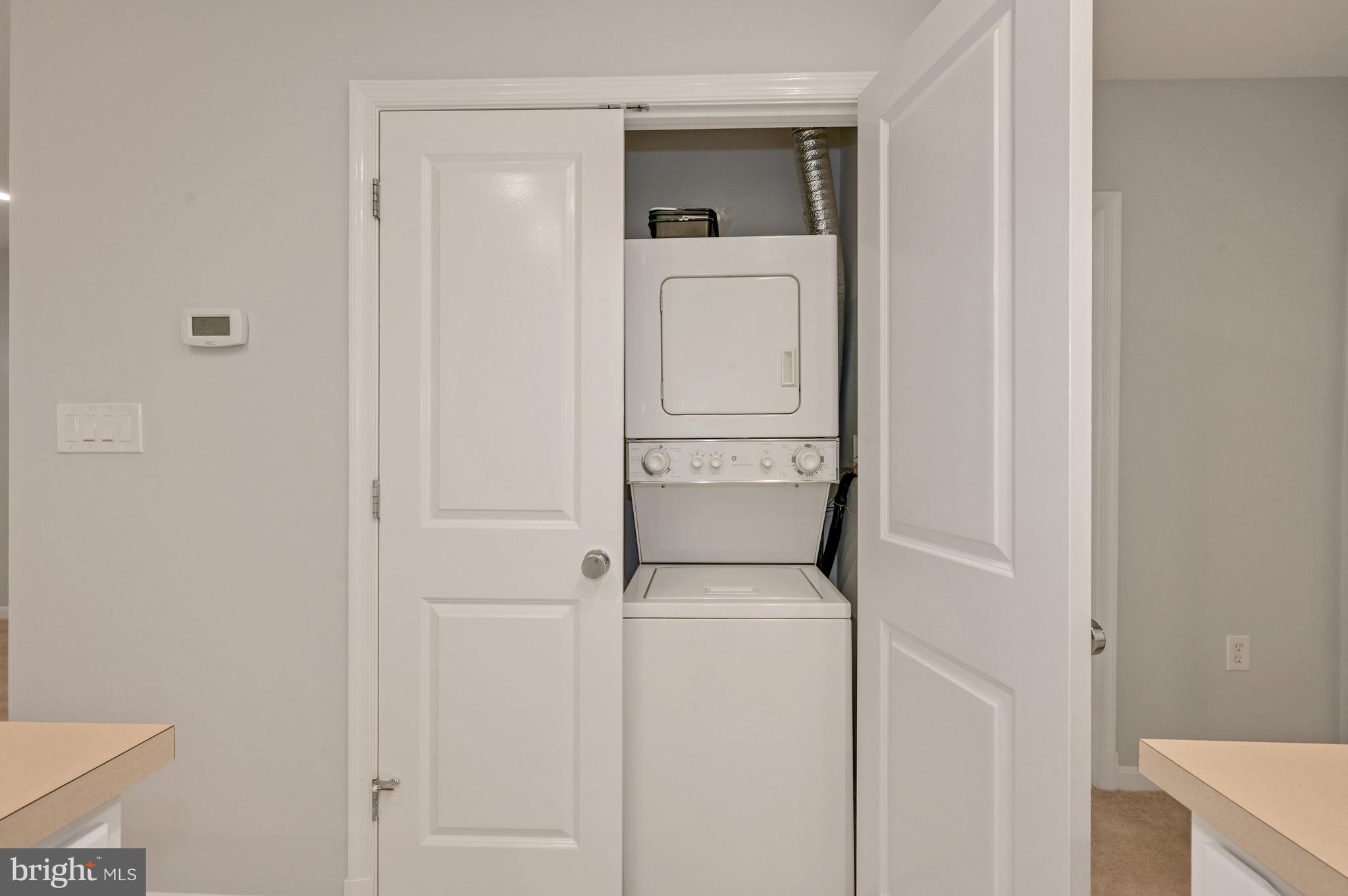 648 C Street Northeast, Unit 1 Washington, DC 20002 - Photo 10 of 17 a utility room with dryer and washer