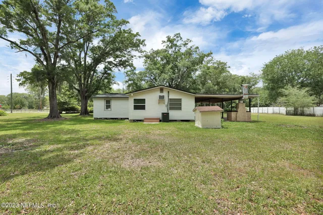 a house view with a garden space