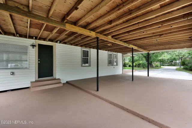 a view of a backyard of a house