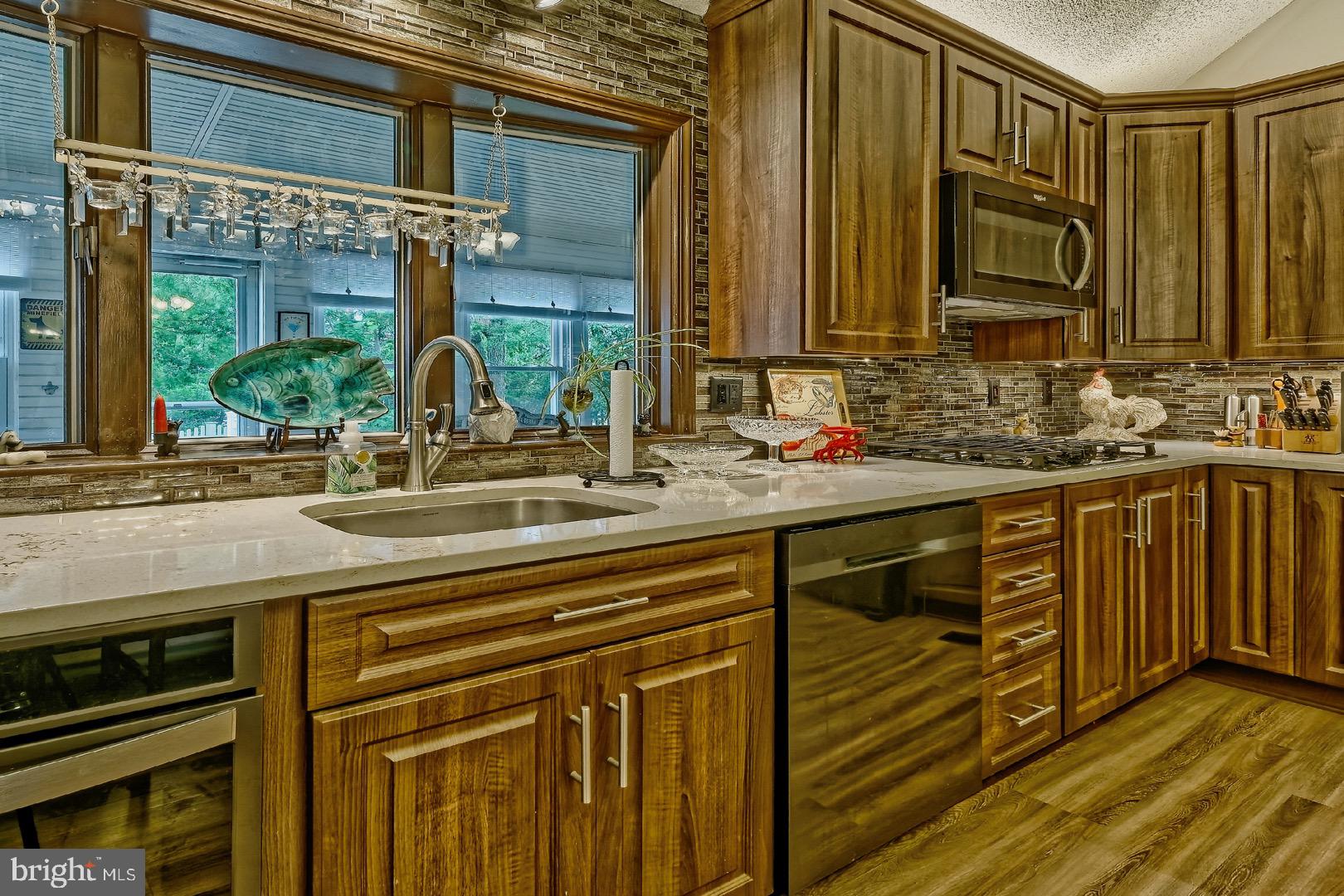 84 Jennings Road Manahawkin, NJ 08050 - Photo 12 of 40 a bathroom with a sink and a mirror