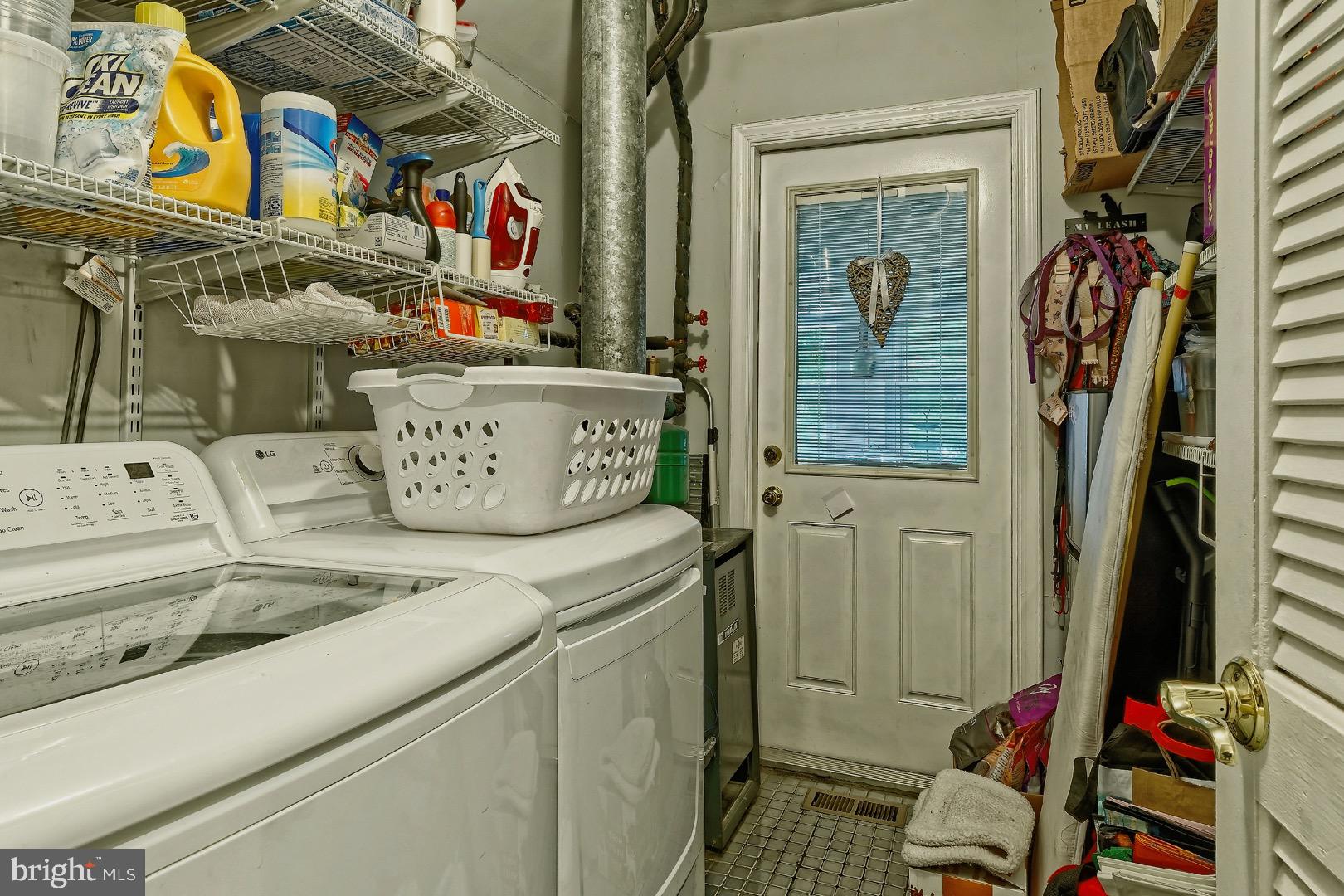 84 Jennings Road Manahawkin, NJ 08050 - Photo 17 of 40 a utility room with dryer and washer