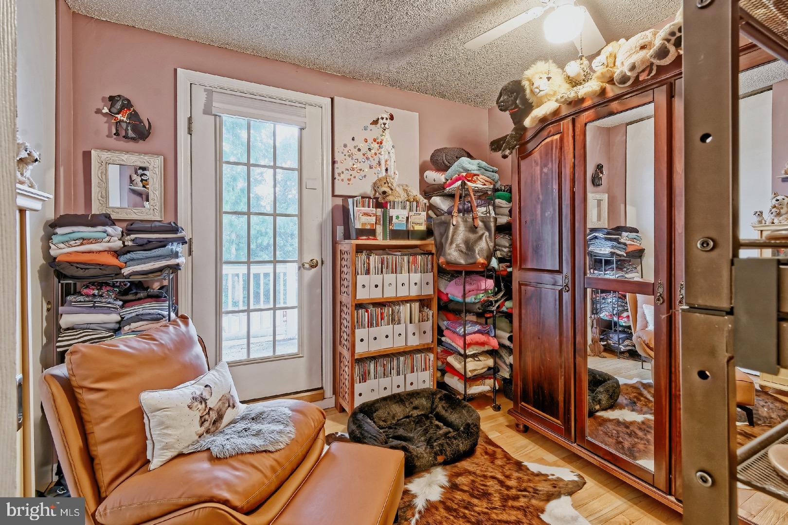 84 Jennings Road Manahawkin, NJ 08050 - Photo 21 of 40 a living room with lots of furniture and a window