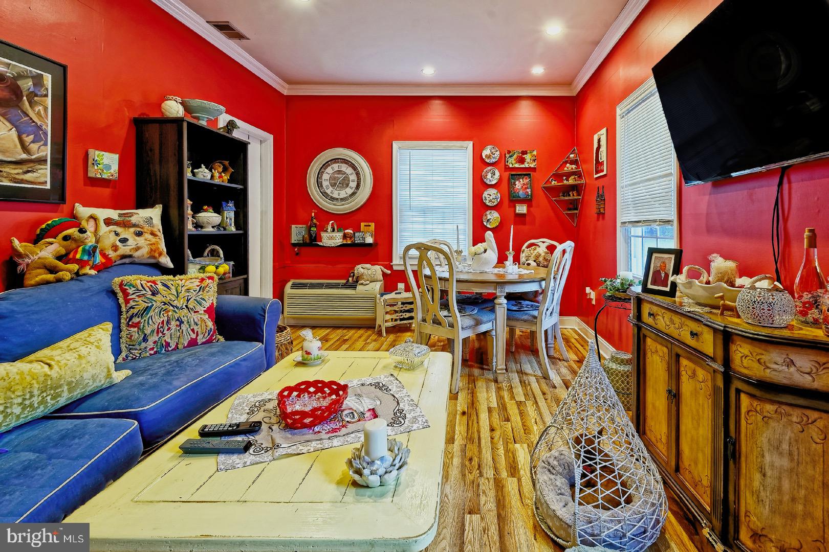 84 Jennings Road Manahawkin, NJ 08050 - Photo 23 of 40 a living room filled with furniture and a flat screen tv