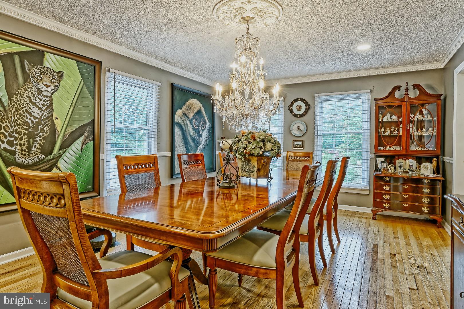 84 Jennings Road Manahawkin, NJ 08050 - Photo 6 of 40 a view of a dining room with furniture and chandelier