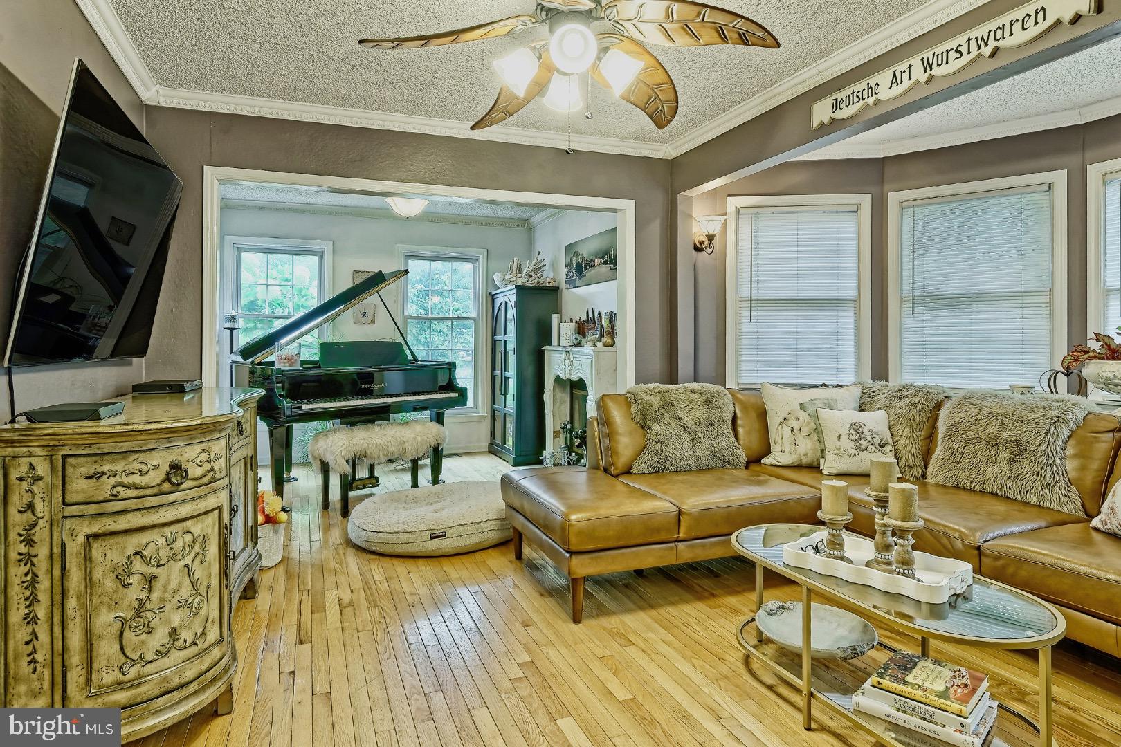 84 Jennings Road Manahawkin, NJ 08050 - Photo 8 of 40 a living room with furniture and a flat screen tv