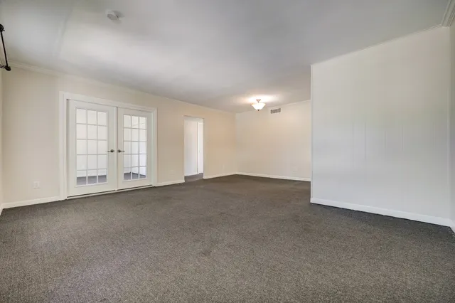 an empty room with windows