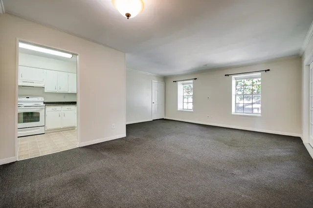 an empty room with windows