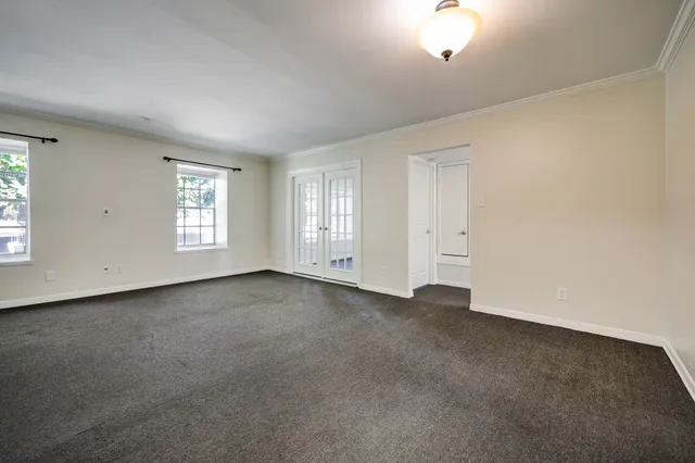 an empty room with windows