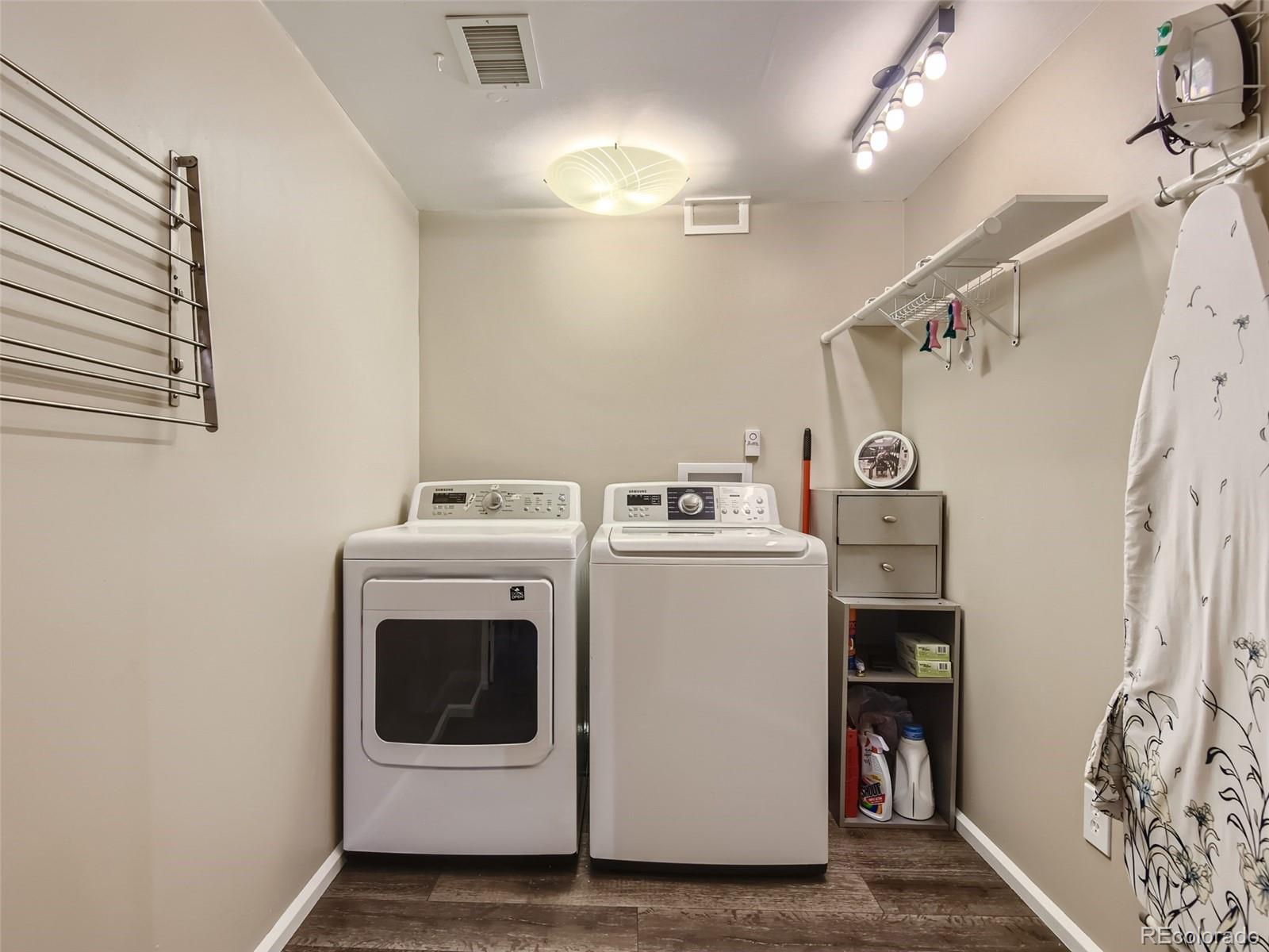 1029 Riddlewood Lane Highlands Ranch, CO 80129 - Photo 22 of 28 a utility room with dryer and washer