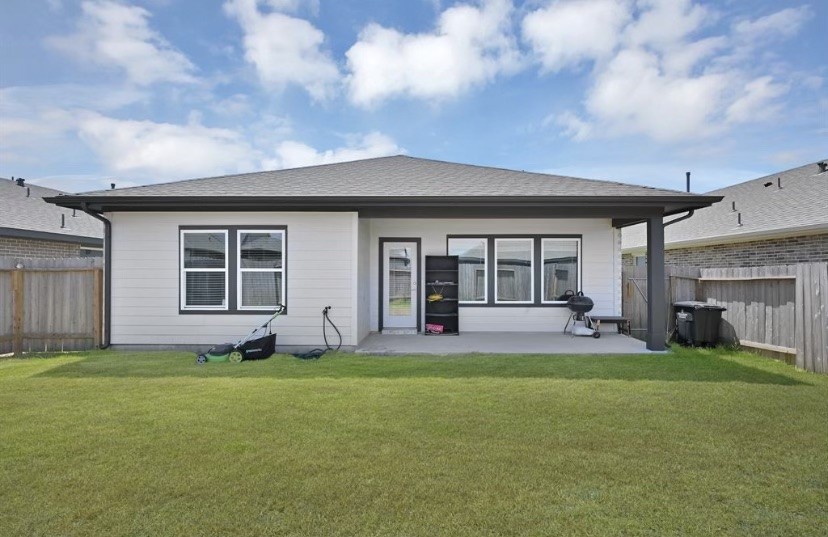 7311 Ramsgate Cliff Lane Richmond, TX 77407 - Photo 19 of 21 a view of a house with a yard and sitting area