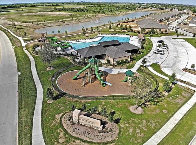 7311 Ramsgate Cliff Lane Richmond, TX 77407 - Photo 20 of 21 a view of a swimming pool with a garden
