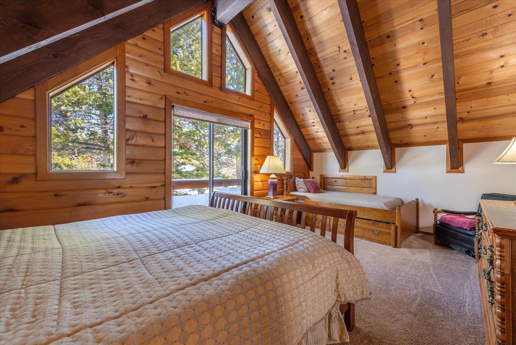 17080 Ski Slope Way Truckee, CA 96161 - Photo 13 of 22 a bedroom with a bed and a window