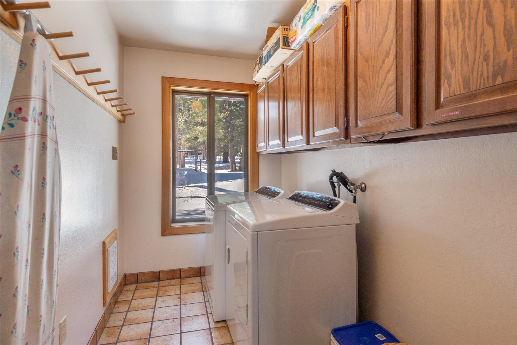 17080 Ski Slope Way Truckee, CA 96161 - Photo 15 of 22 a utility room with dryer and washer