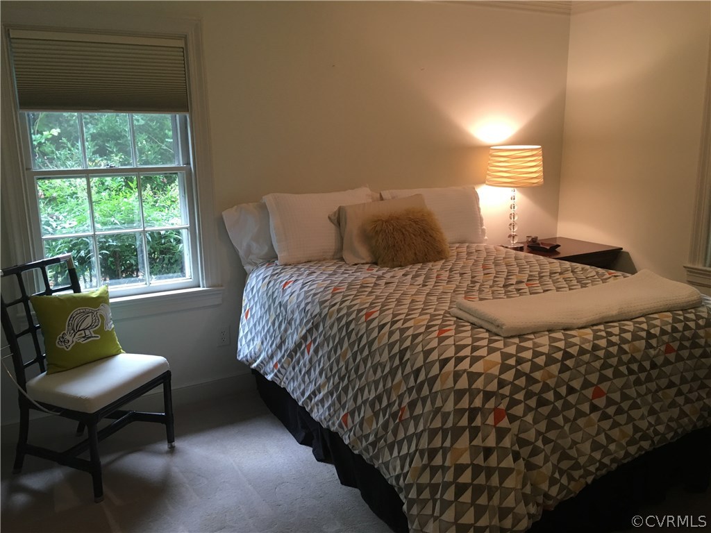 300 Ralston Road Henrico, VA 23229 - Photo 12 of 14 a bedroom with a bed chair and window