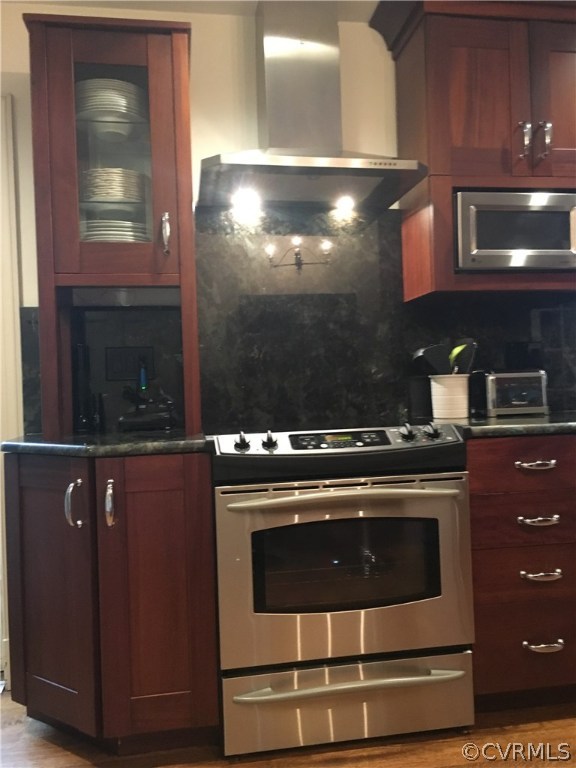 300 Ralston Road Henrico, VA 23229 - Photo 7 of 14 a stove top oven sitting inside of a kitchen