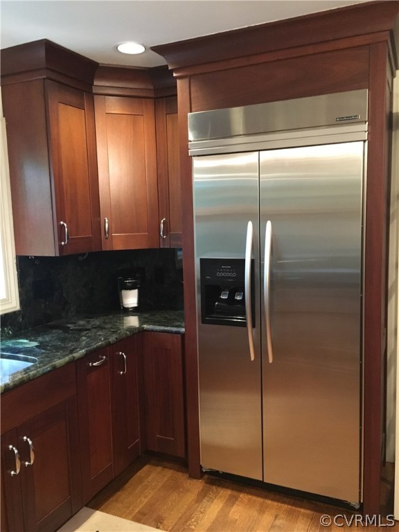 300 Ralston Road Henrico, VA 23229 - Photo 8 of 14 a kitchen with a refrigerator and cabinets