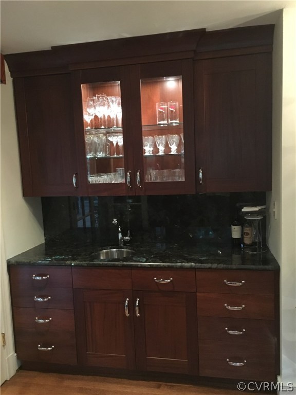 300 Ralston Road Henrico, VA 23229 - Photo 9 of 14 a kitchen with a sink and cabinets