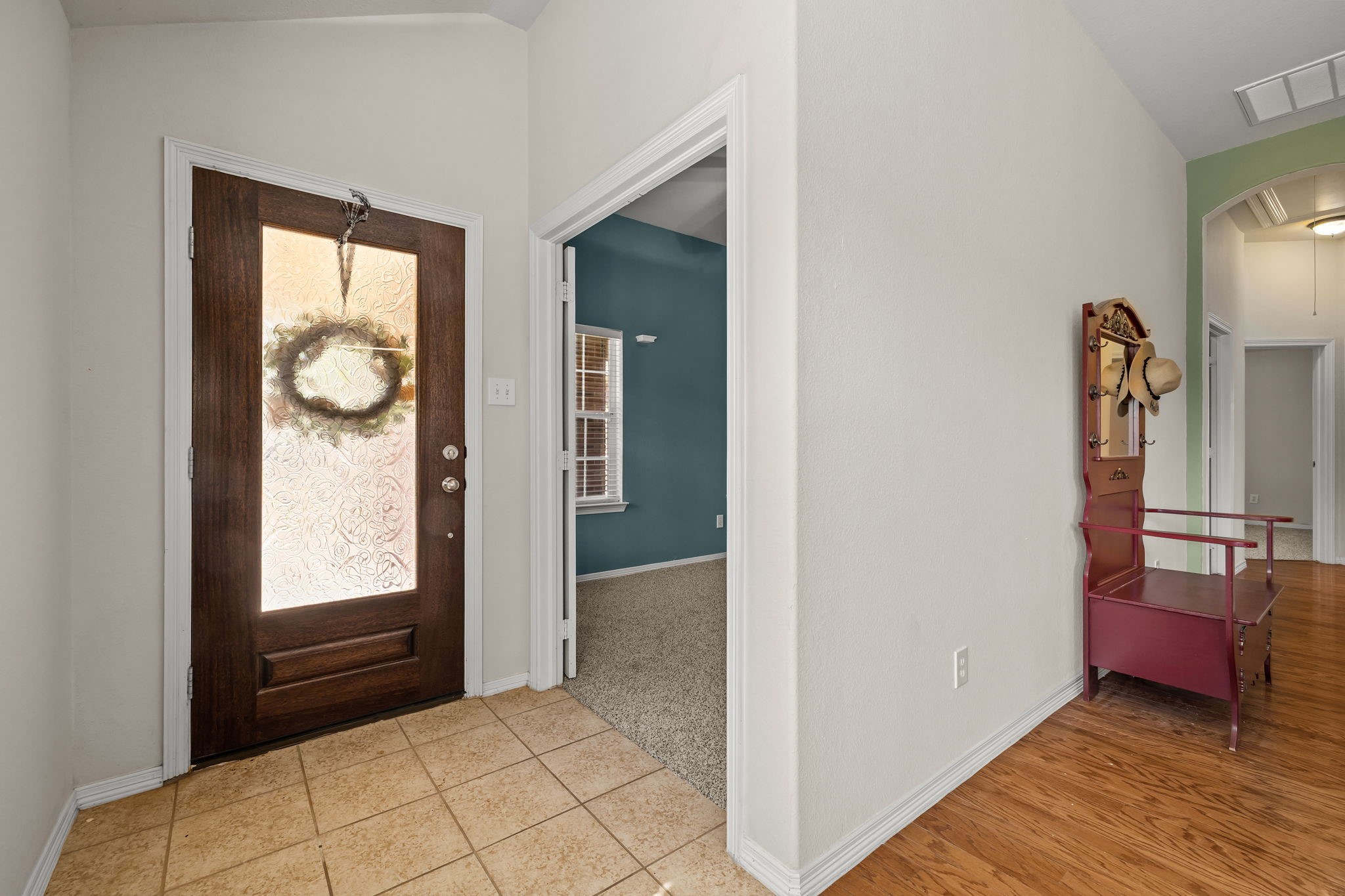 445 Decoster Boulevard Alvin, TX 77511 - Photo 5 of 32 Tiled Entry and Study or 4th Bedroom with a ton of natural light