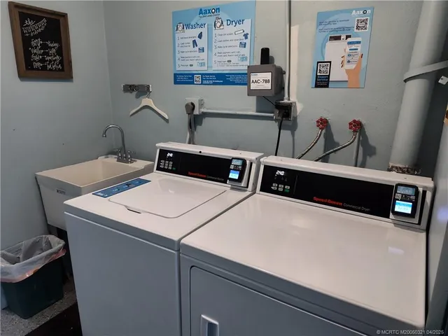 a utility room with dryer and washer