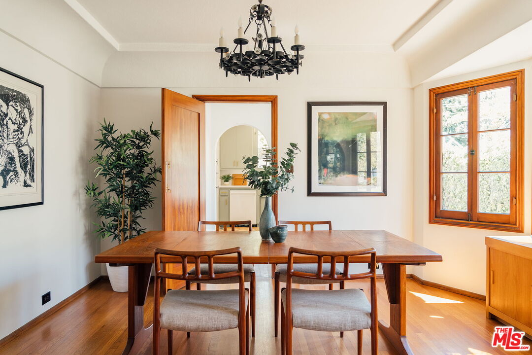 2101 Lambert Drive Pasadena, CA 91107 - Photo 11 of 48 a view of a dining room with furniture window and wooden floor