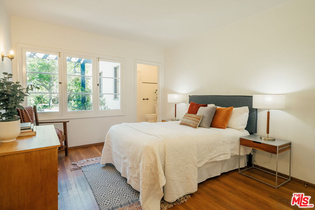 2101 Lambert Drive Pasadena, CA 91107 - Photo 28 of 48 a bedroom with a bed and a large window