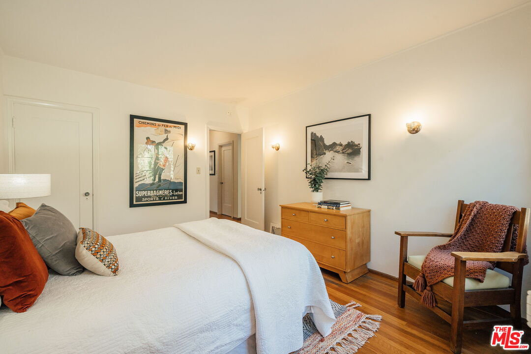 2101 Lambert Drive Pasadena, CA 91107 - Photo 30 of 48 a bedroom with a bed and wooden floor