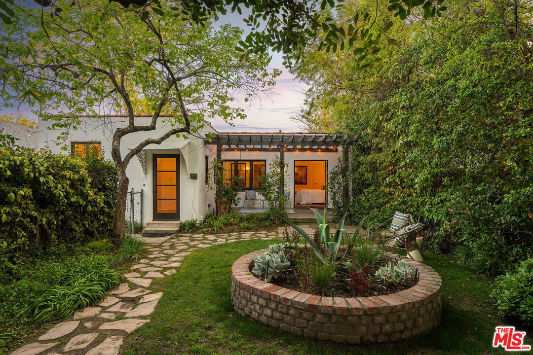 2101 Lambert Drive Pasadena, CA 91107 - Photo 38 of 48 a front view of a house with a garden