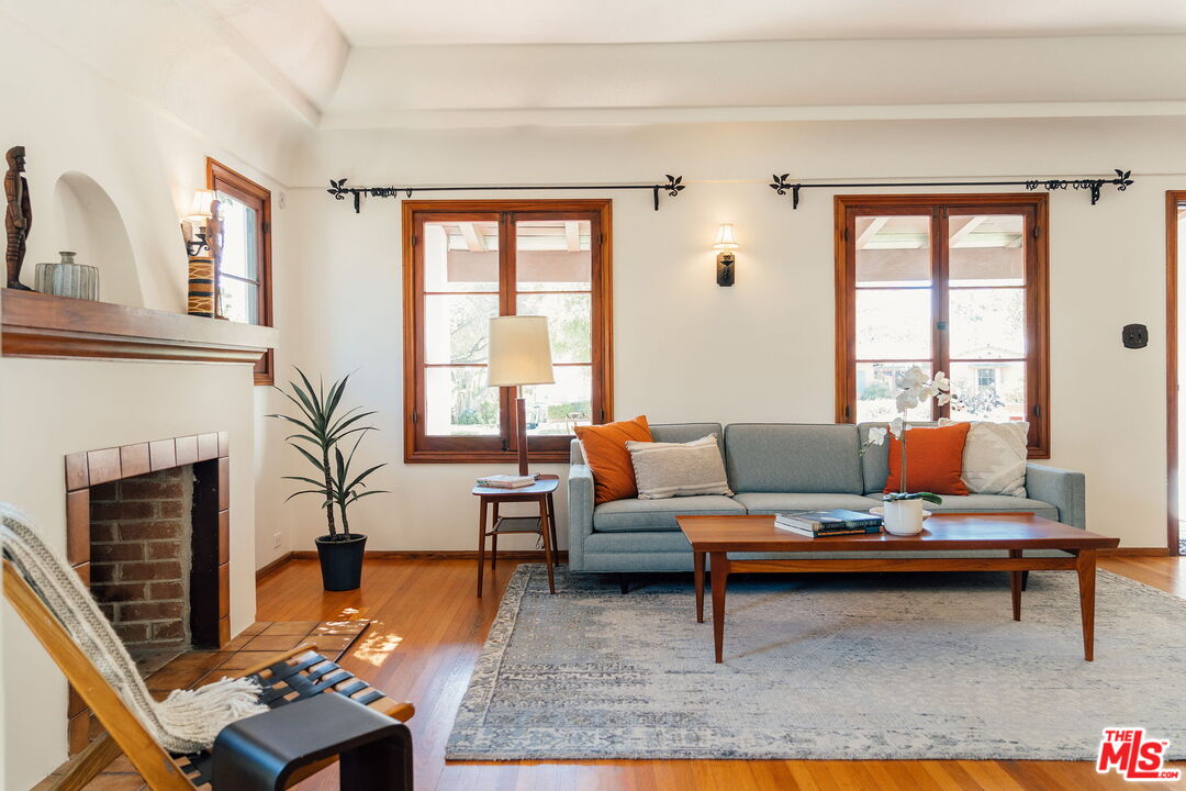2101 Lambert Drive Pasadena, CA 91107 - Photo 8 of 48 a living room with furniture fireplace and window