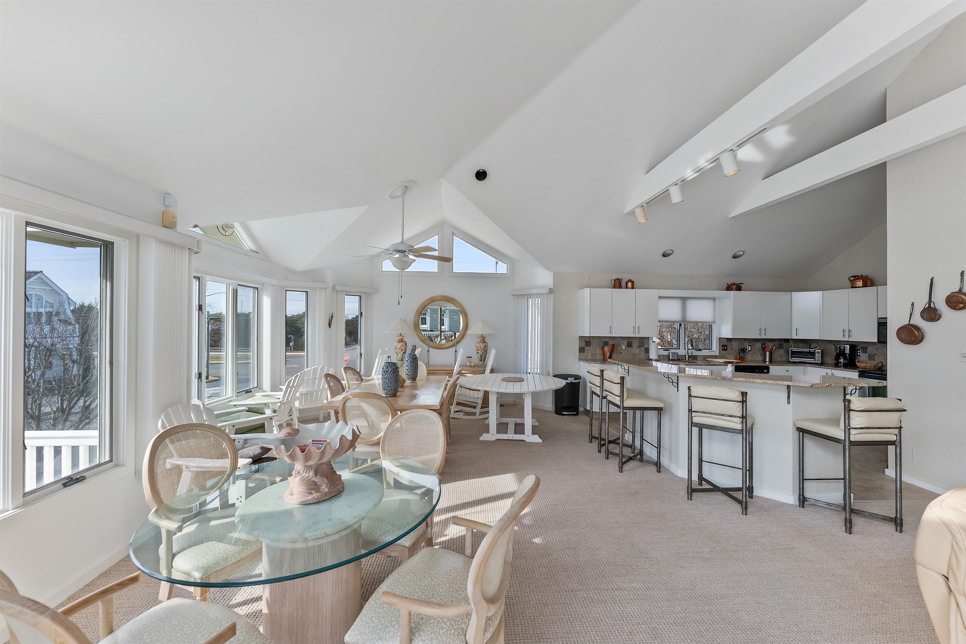 177 71st Street Avalon, NJ 08202 - Photo 12 of 44 a living room with lots of furniture and kitchen view