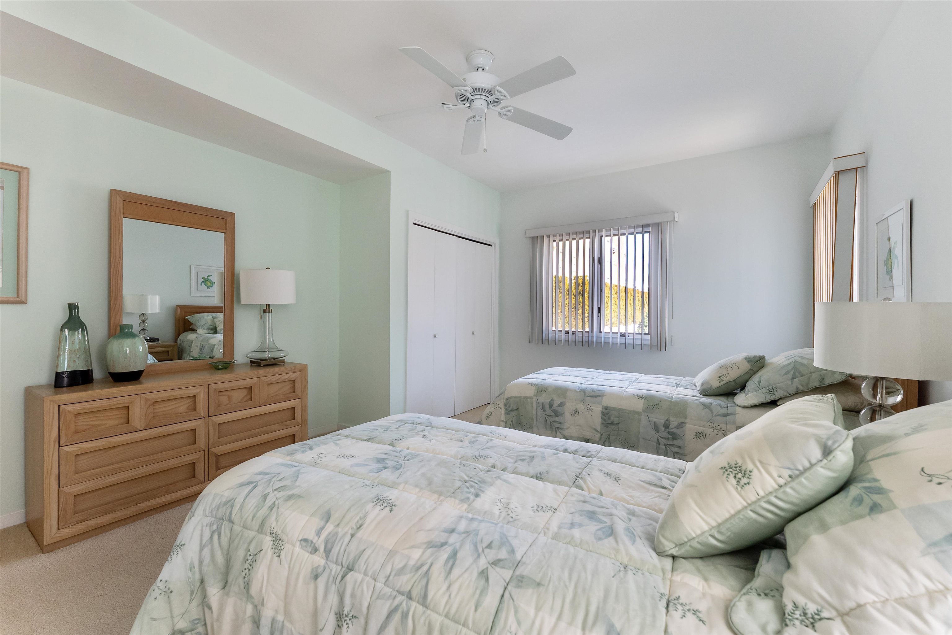 177 71st Street Avalon, NJ 08202 - Photo 15 of 44 a bedroom with a bed and a dresser
