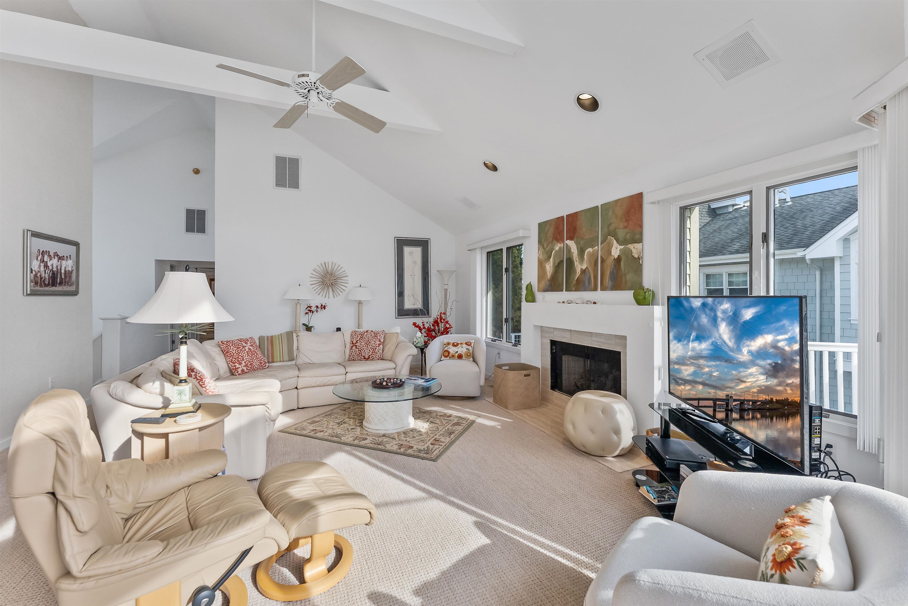 177 71st Street Avalon, NJ 08202 - Photo 31 of 44 a living room with furniture fireplace and a fireplace