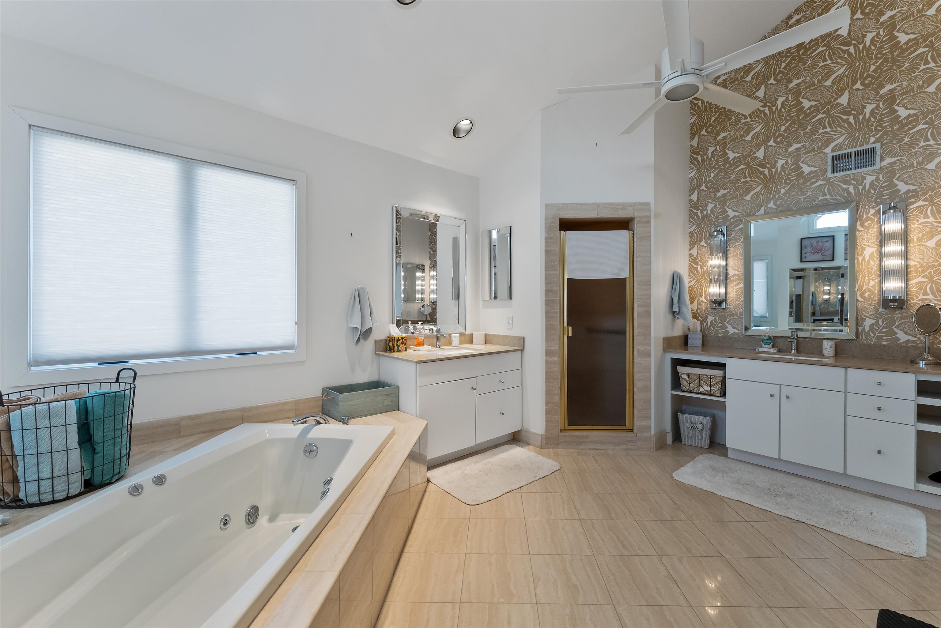 177 71st Street Avalon, NJ 08202 - Photo 42 of 44 a large bathroom with a large tub sink vanity and granite