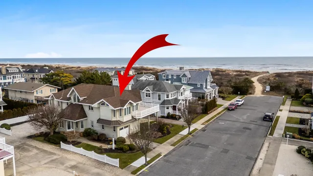 an aerial view of houses with outdoor space