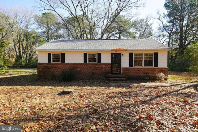 front view of house with a yard